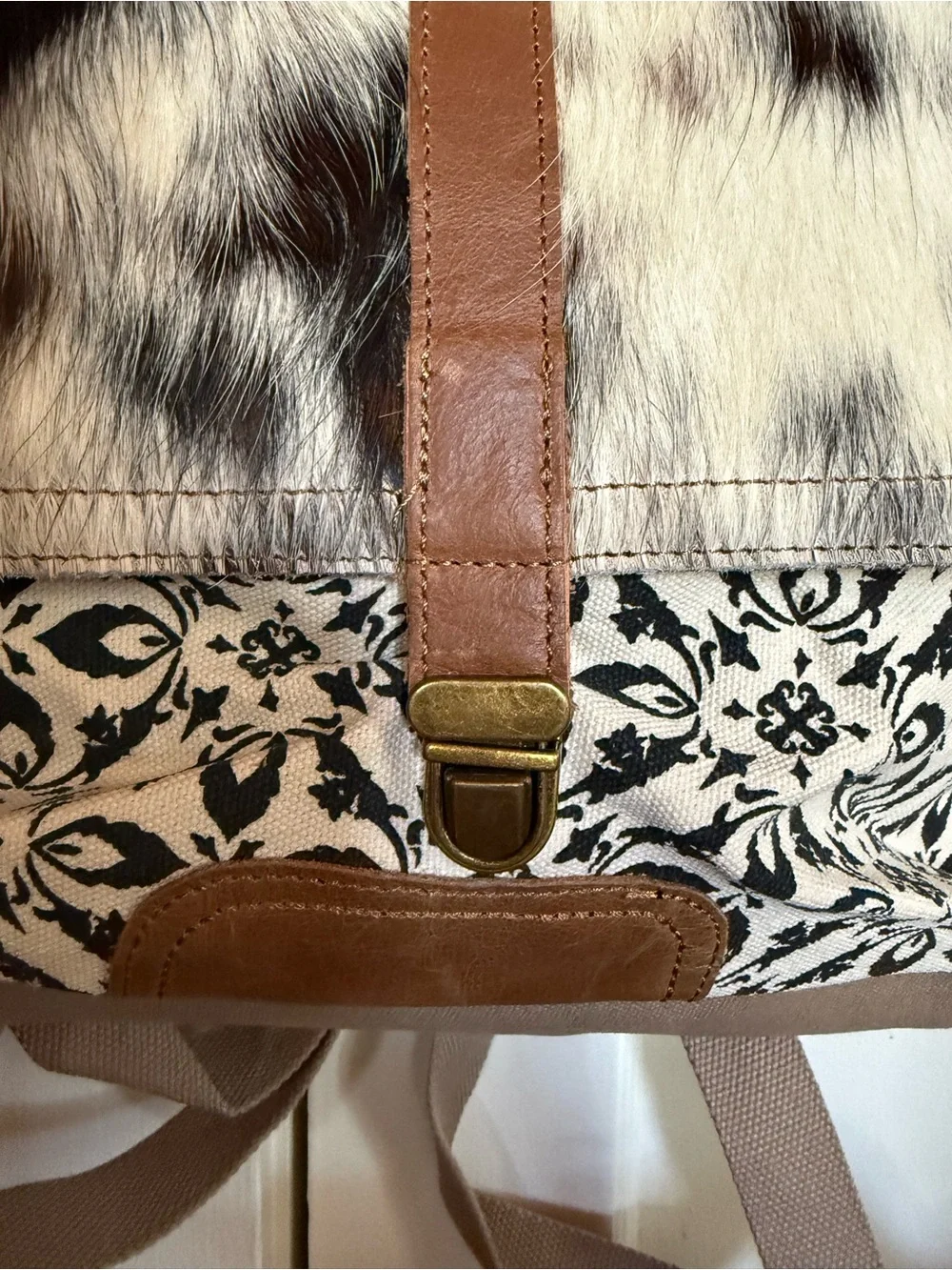 Neutral Cowhide-Pattern Canvas Backpack with Brown Trim